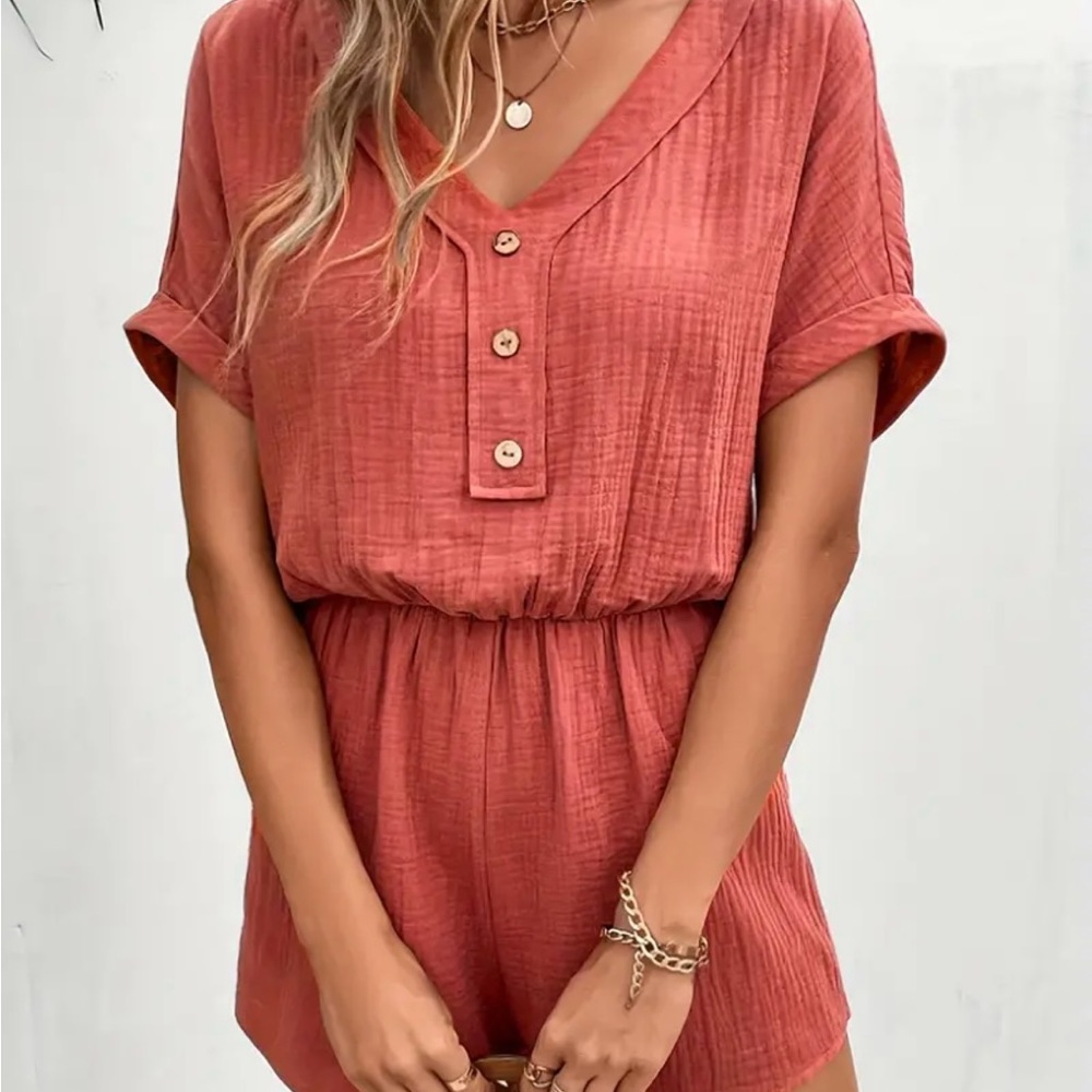 New Romper without tags. Runs small, would fit Medium/Large 10/12 well.